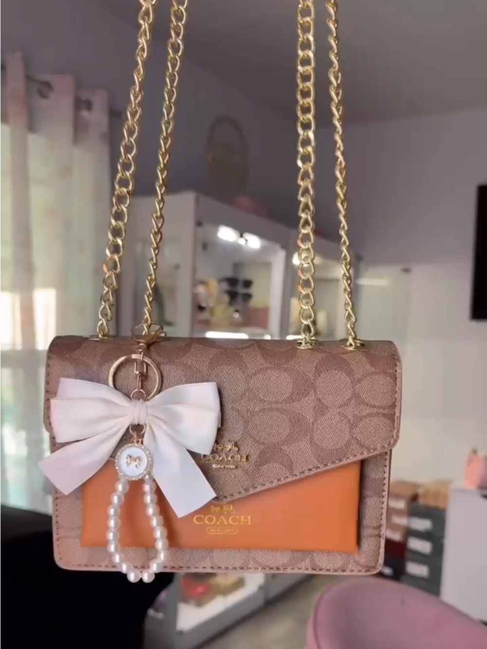 Coach Tan Signature Crossbody with White Bow & Pearl Charm